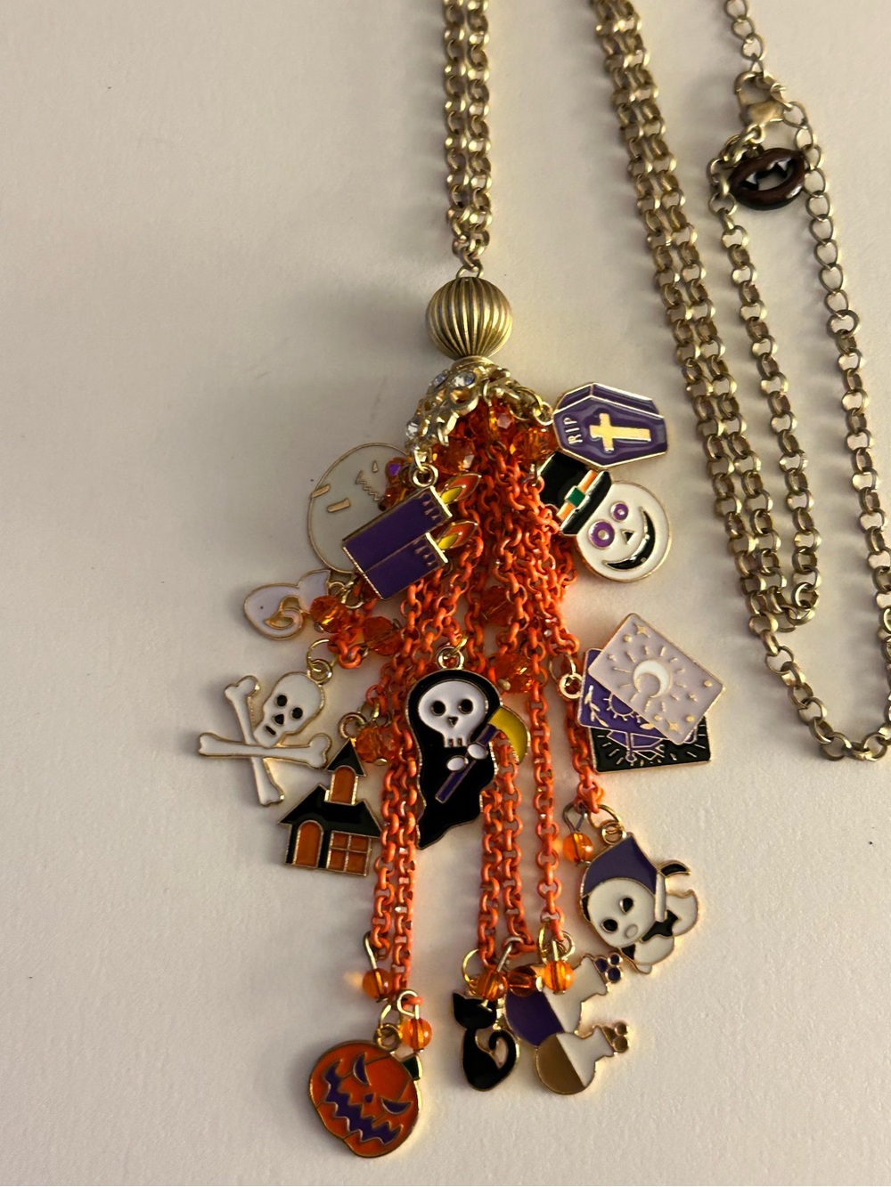 NWOT charms necklace fun Ghouls on vintage orange crystal tassel chain